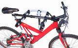 Bike Adapter Pro mounted on a red full suspension mountain bike for secure transport.