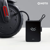HOTO Electric Air Pump attached to scooter tire, showing digital pressure reading.
