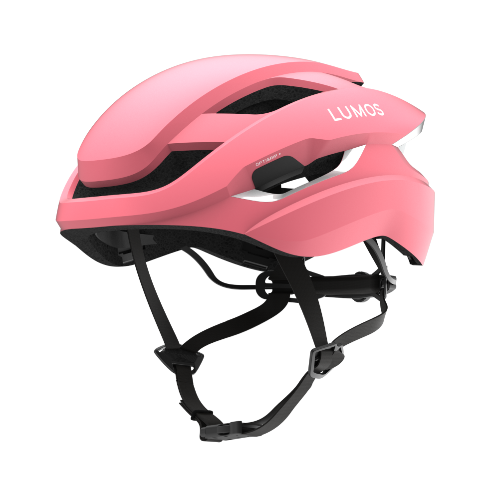 Lumos Ultra Fly helmet in pink with integrated smart lighting features.