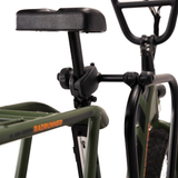 Adjustable frame clamp and seat post of green electric bike on rack.