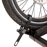 Adjustable strap securing electric bike tire on Destination E hitch rack.