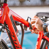 Securing red electric bike to Destination E hitch bike rack